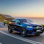 벤츠 GLE 쿠페의 최신 옵션 - **Dynamic Coastal Drive at Sunset**
    A sleek, dark blue Mercedes-Benz GLE Coupé, with its newly r...