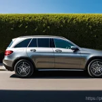벤츠 GLC와 현대 투싼 비교 - **Prompt:** A luxurious Mercedes-Benz GLC, in a sleek metallic gray, is gracefully parked along Lisb...